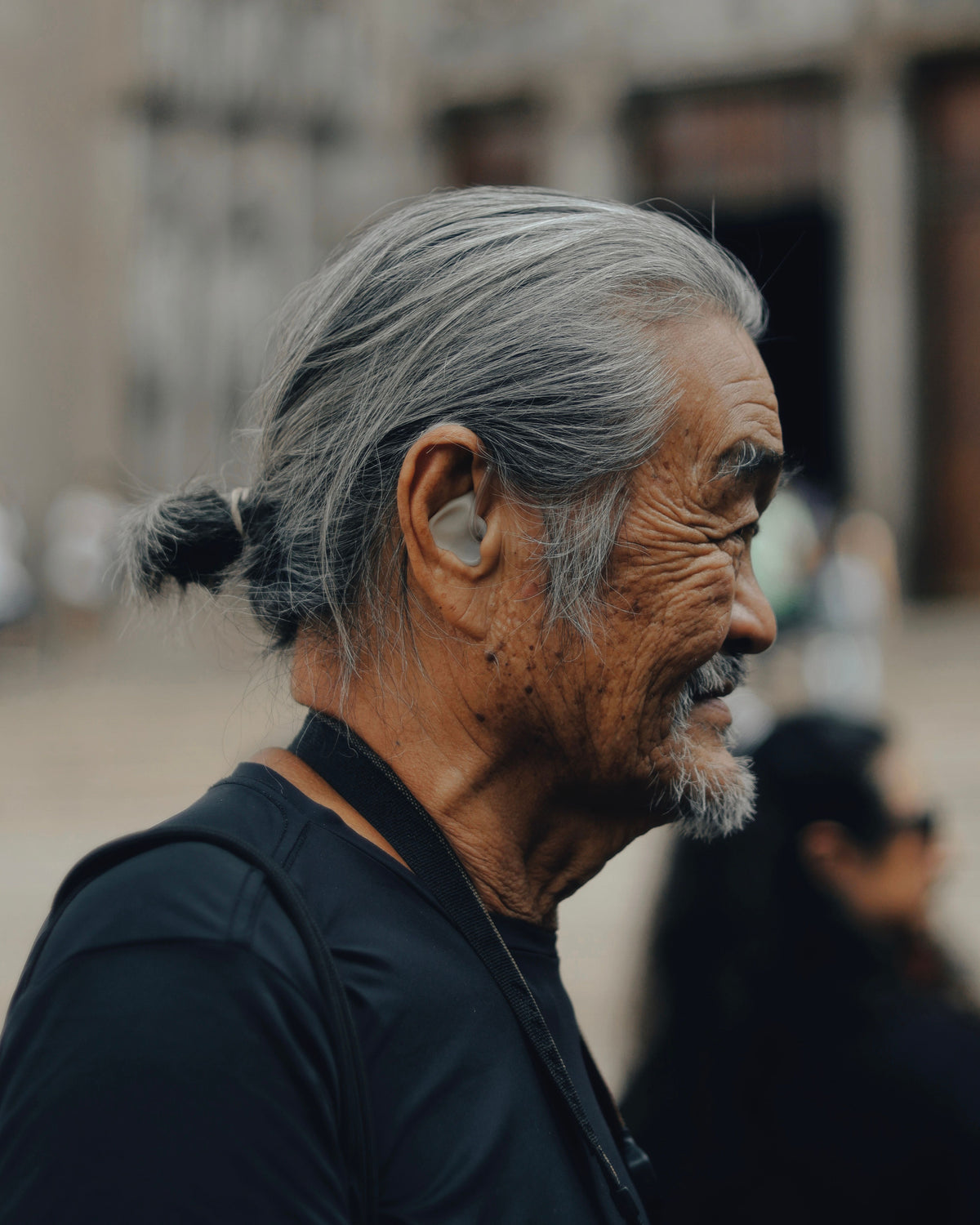 Older adult shown in side profile
